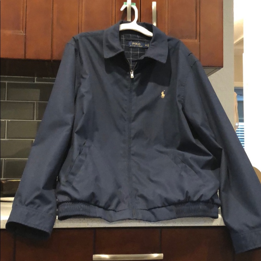 Men’s polo jacket. Size medium.  Blue.